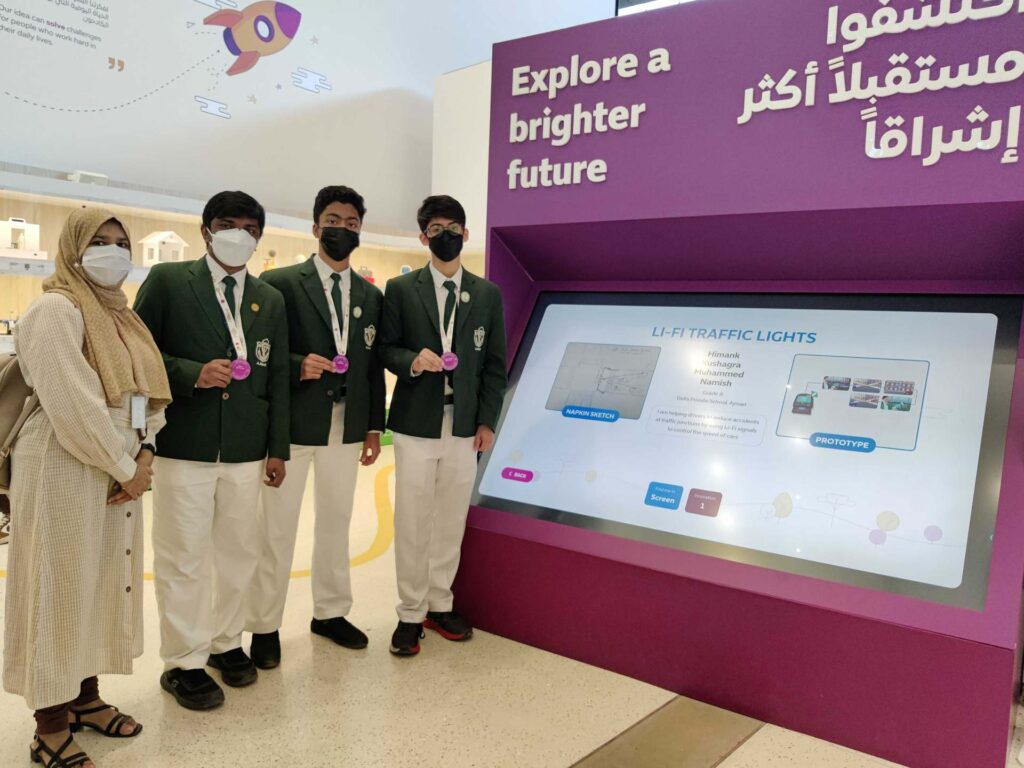 DPS Ajman students exploring an interactive "Explore a brighter future" exhibit